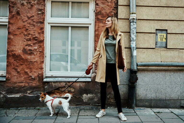 woman walks with dog 2022 12 16 12 37 11 utc